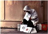 Tes La Rok surrounded by Dubplates